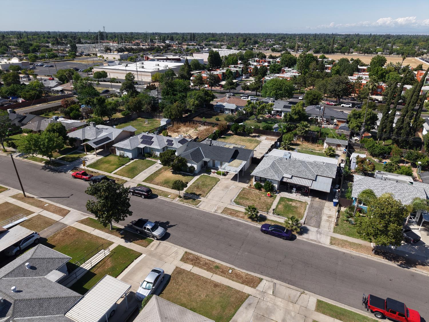 1004 West Pontiac Way Fresno, CA 93705 - Photo 31 of 34 an aerial view of a house with a parking space