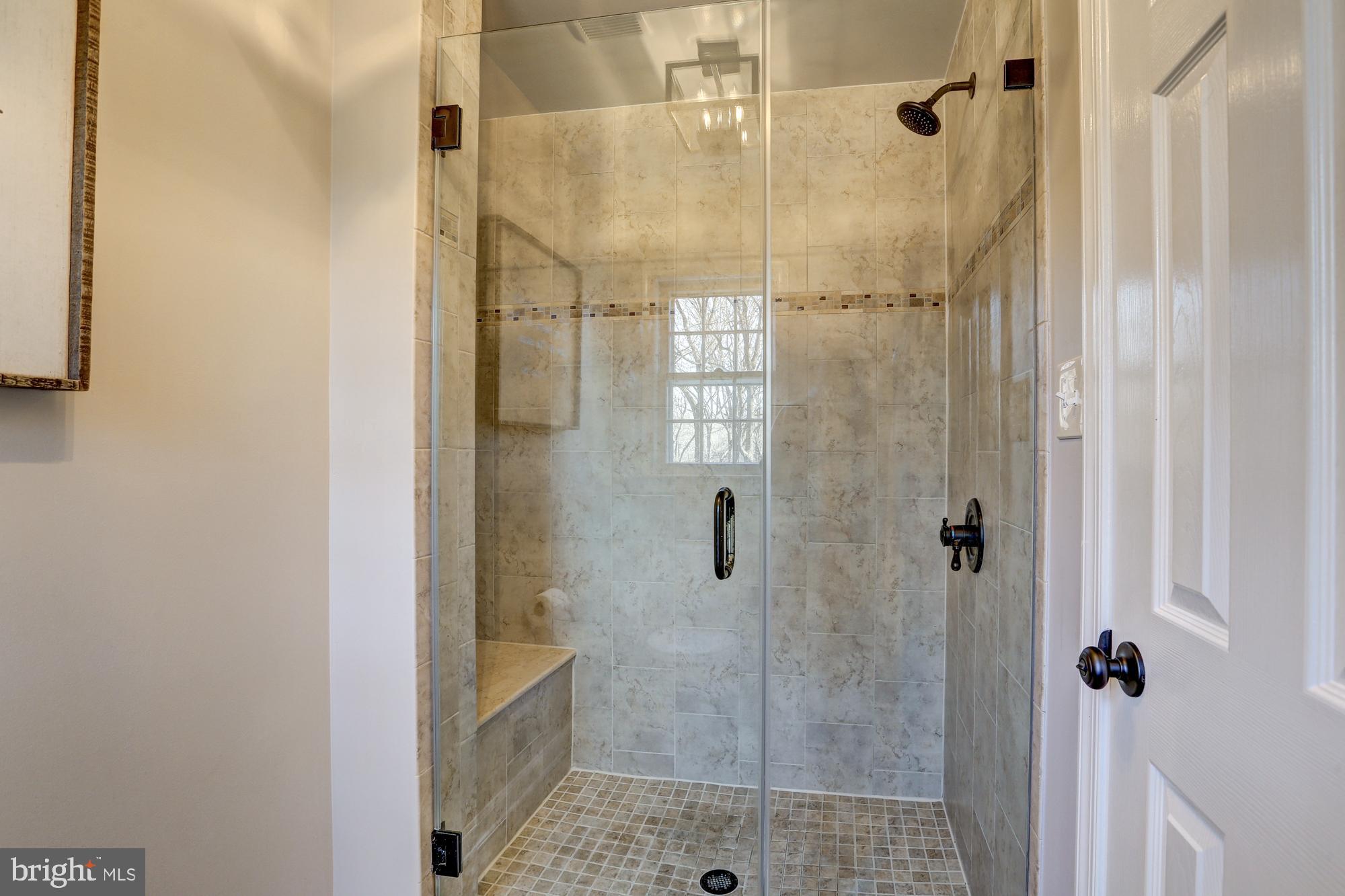 17943 Pond Road Ashton, MD 20861 - Photo 34 of 77 gorgeously detailed shower with seating