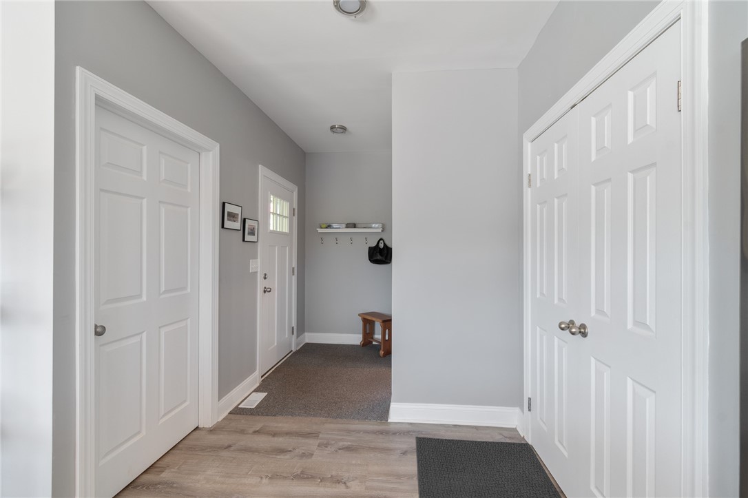 8249 Dogwood Road Huron, NY 14590 - Photo 3 of 33 Entranceway, left to basement 2 doors right pantry