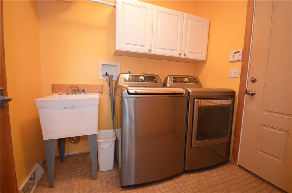 714 Park Road Clinton, PA 15026 - Photo 13 of 25 First floor laundry in mud room off of kitchen. One of two laundry areas