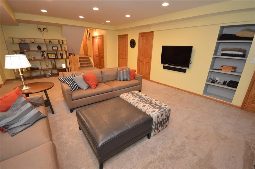 714 Park Road Clinton, PA 15026 - Photo 14 of 25 finished basement has gas fireplace and 5th bedroom.