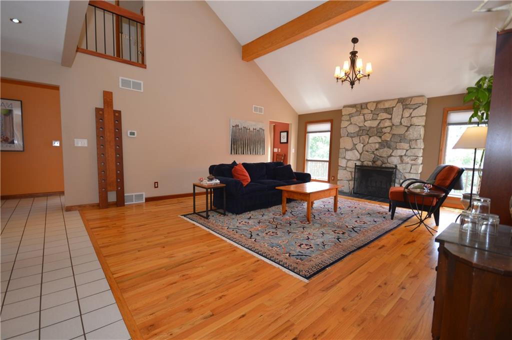 714 Park Road Clinton, PA 15026 - Photo 5 of 25 Living room on main floor with wood burning fireplace.