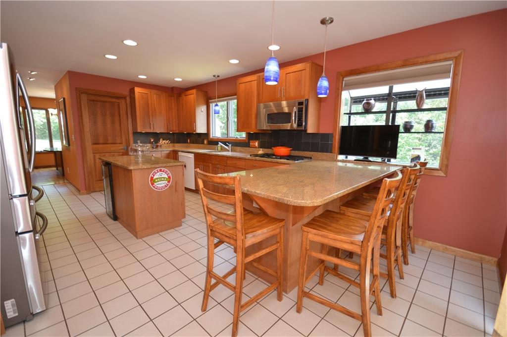 714 Park Road Clinton, PA 15026 - Photo 7 of 25 Custom Cherry Hardwood cabinets with granite countertops.