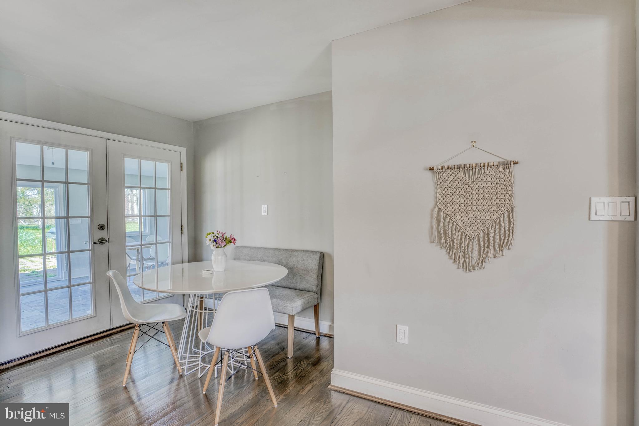 2818 Pinewick Road Ellicott City, MD 21042 - Photo 28 of 75 Dining nook opens to generous sunroom/family room