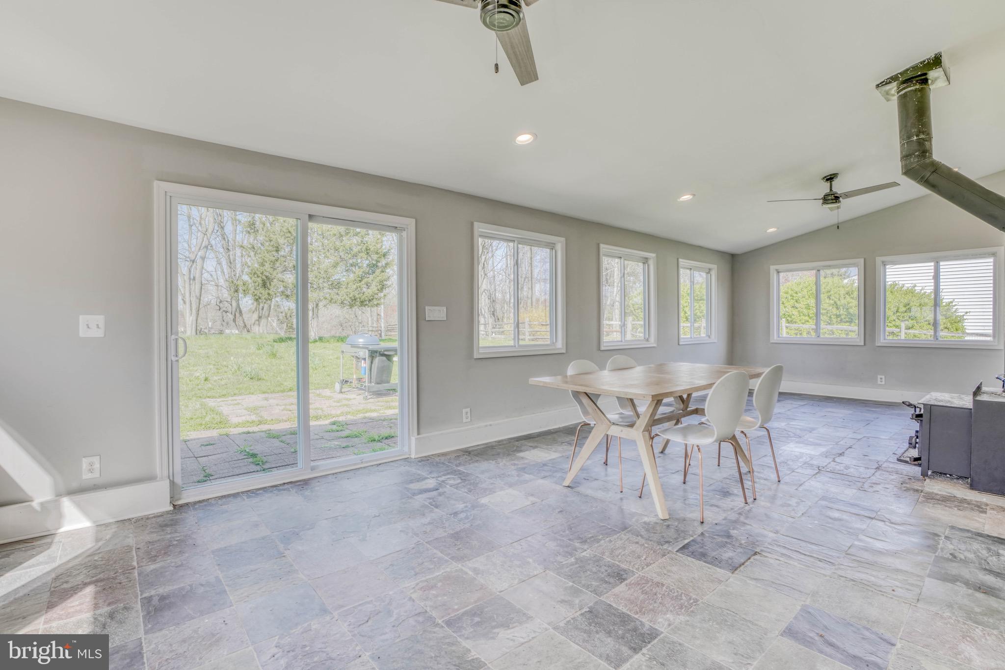 2818 Pinewick Road Ellicott City, MD 21042 - Photo 31 of 75 Slate-tiled Sunroom is perfect for 3-season living