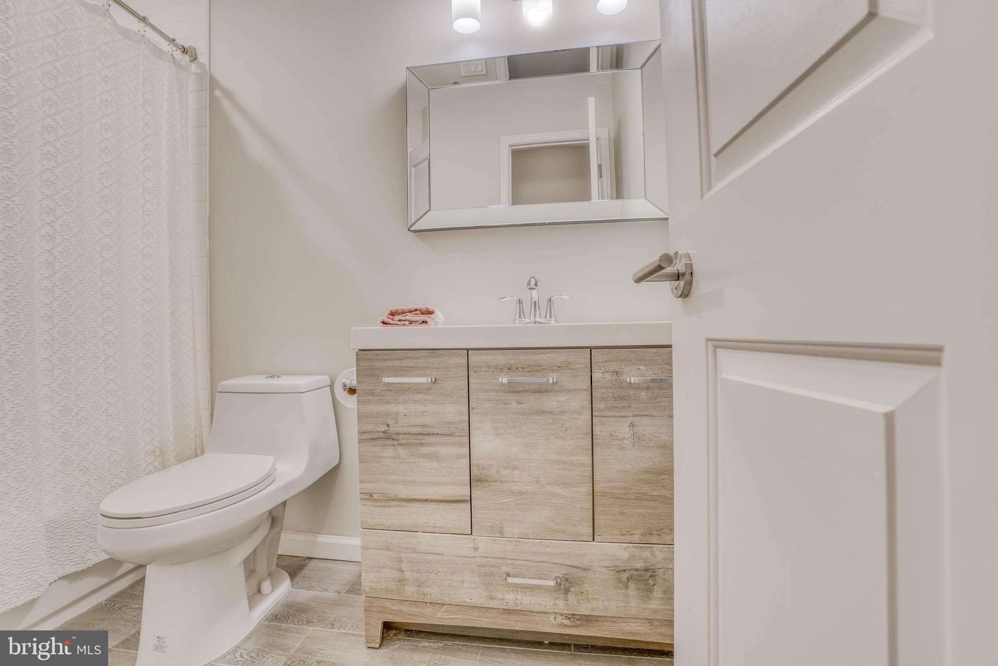 2818 Pinewick Road Ellicott City, MD 21042 - Photo 47 of 75 Newly Renovated Hall Bath