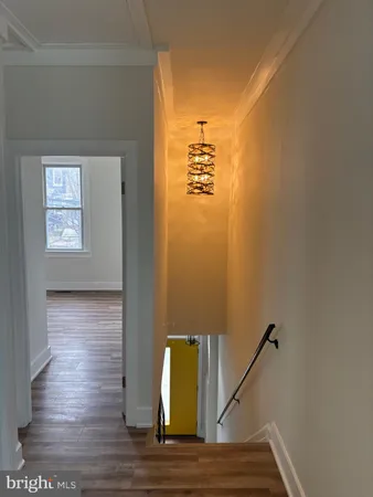 a view of a livingroom with wooden floor