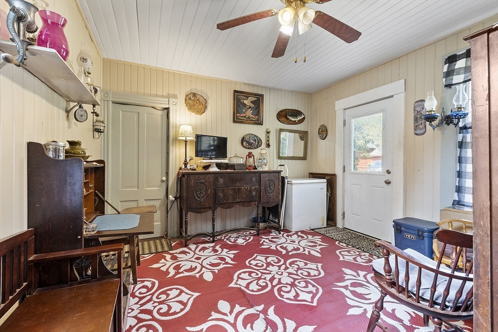 171 South Road Templeton, MA 01436 - Photo 17 of 38 a bedroom with furniture and a chandelier