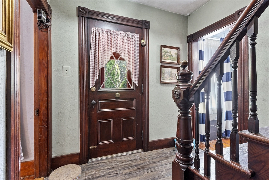 171 South Road Templeton, MA 01436 - Photo 18 of 38 a view of front door with wooden floor and stairs