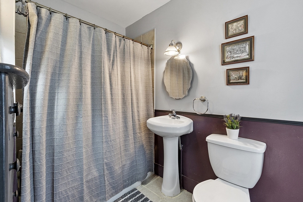 171 South Road Templeton, MA 01436 - Photo 20 of 38 a bathroom with a toilet a sink and a mirror