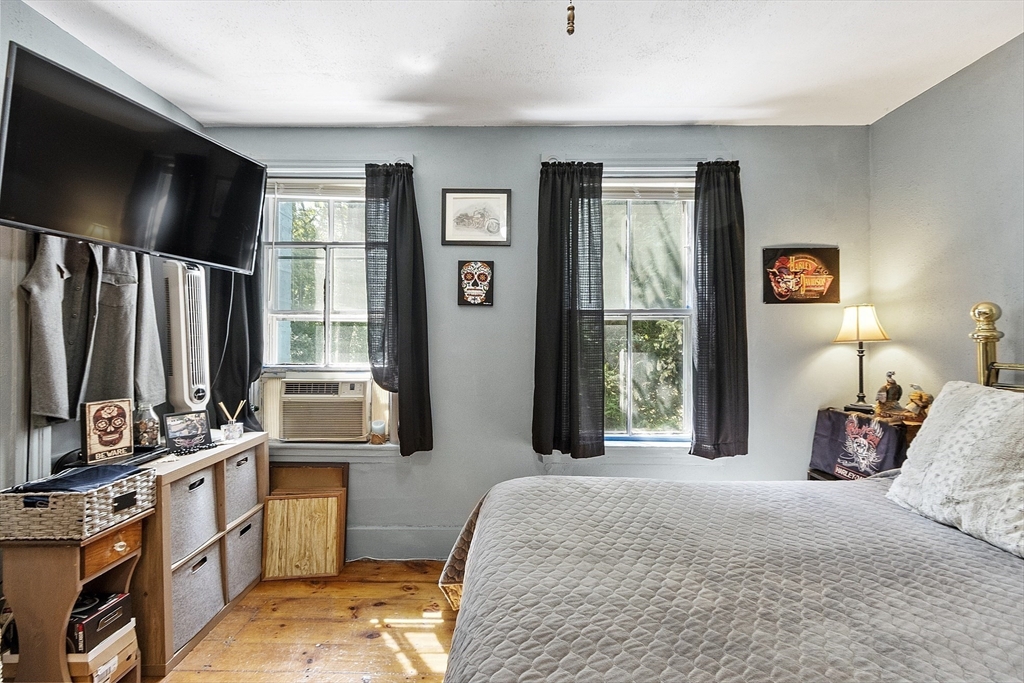 171 South Road Templeton, MA 01436 - Photo 24 of 38 a bedroom with a bed window and flat screen tv