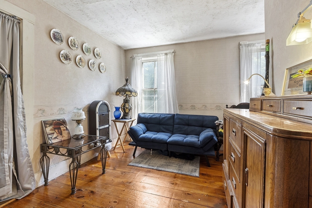 171 South Road Templeton, MA 01436 - Photo 31 of 38 a living room with furniture and a flat screen tv