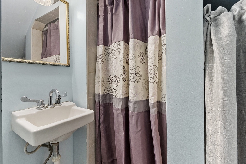 171 South Road Templeton, MA 01436 - Photo 32 of 38 a bathroom with a sink a mirror and a shower
