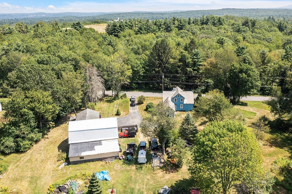 171 South Road Templeton, MA 01436 - Photo 33 of 38 a view of a house with a yard and sitting area