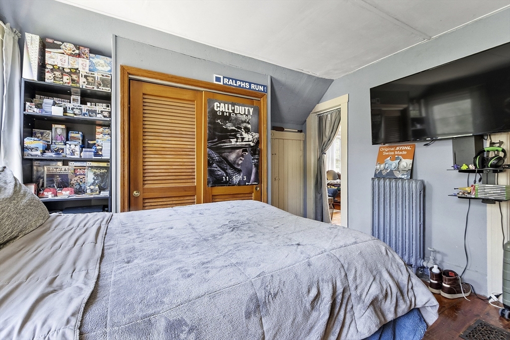 171 South Road Templeton, MA 01436 - Photo 34 of 38 a bed sitting in a bedroom next to a window