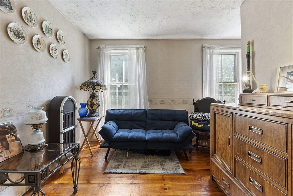 171 South Road Templeton, MA 01436 - Photo 35 of 38 a living room with furniture a couch and a window