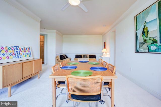 a dining room with furniture and a table