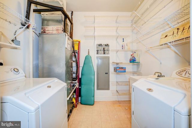 a city street lined with buildings and cars