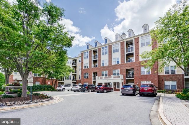 a sign board with parking space