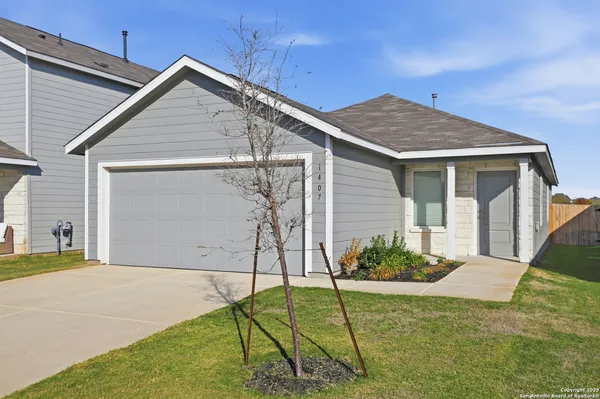 a view of backyard of a house