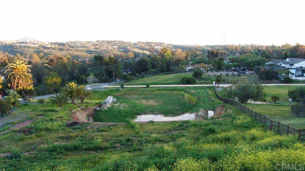 a view of a lake with a yard