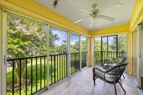 a living room with large windows