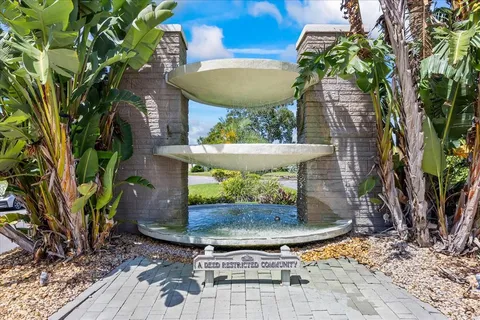 a view of a chairs and table in the patio