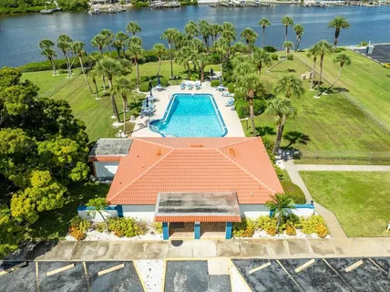 an aerial view of a house with a lake view
