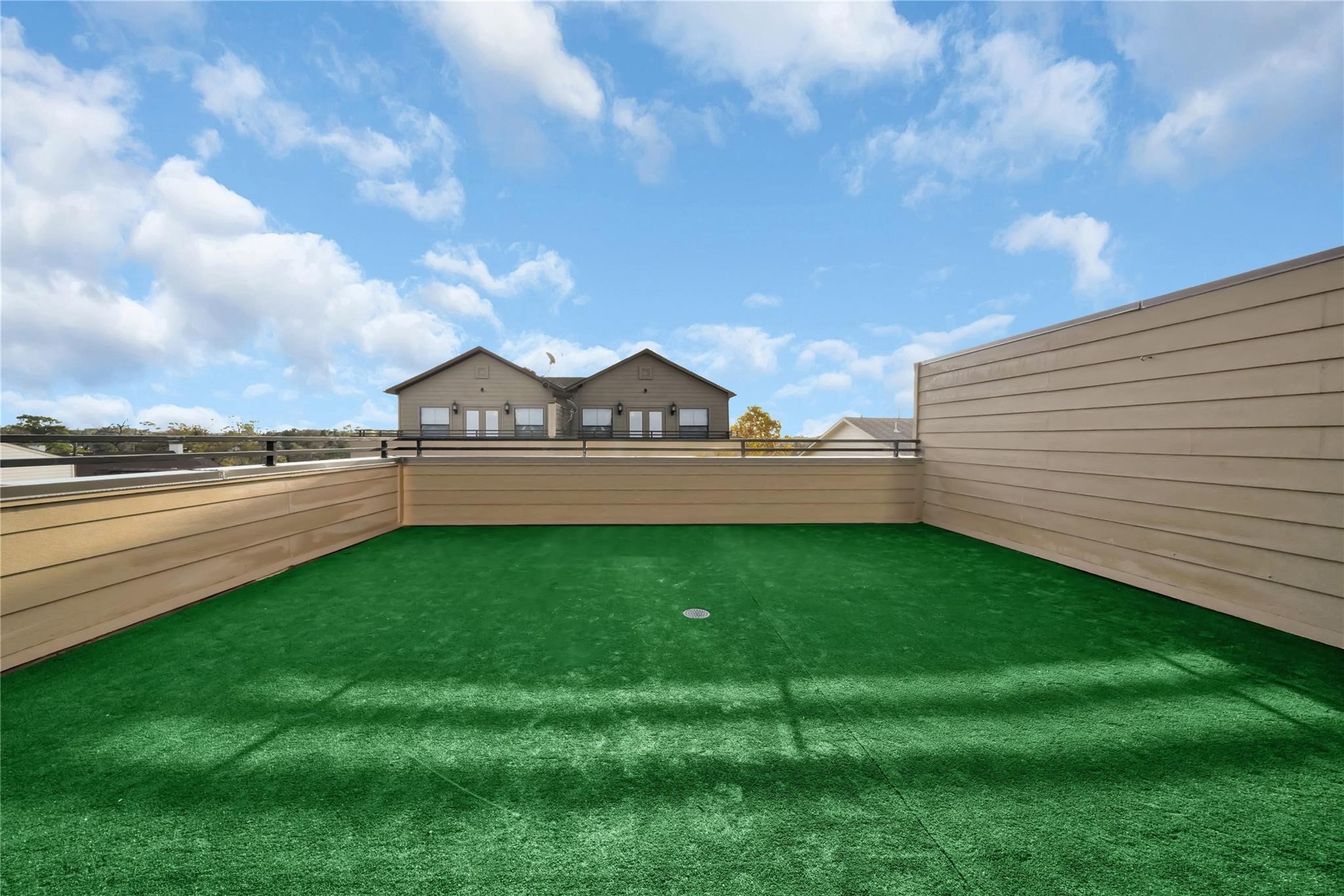 2609 Riverside Drive, Unit C Houston, TX 77004 - Photo 29 of 32 a view of a yard with an outdoor space and seating