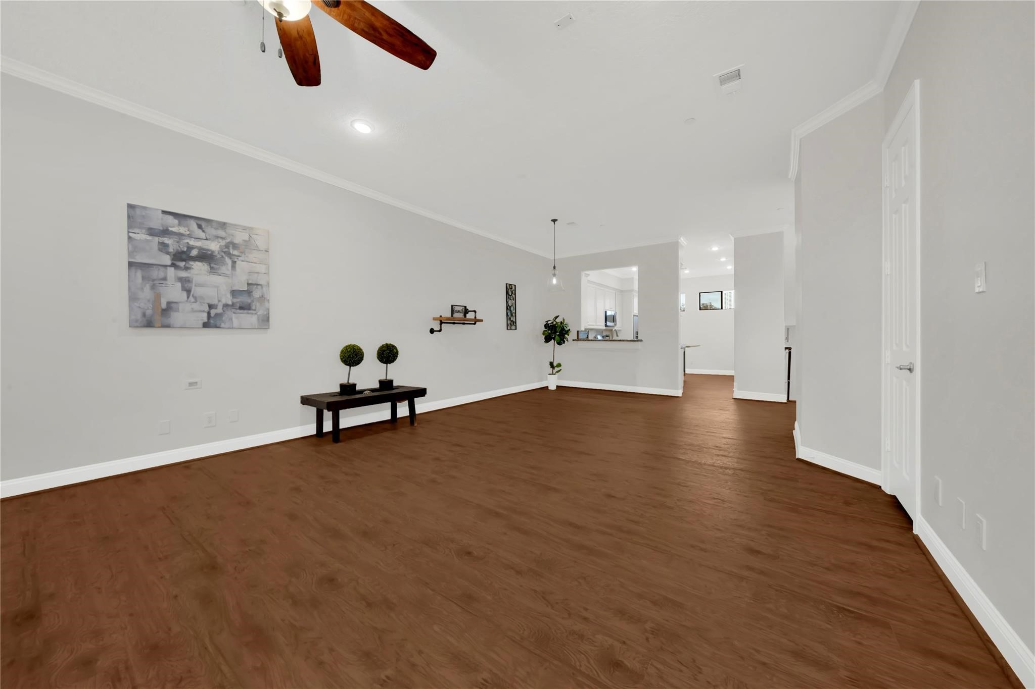 2609 Riverside Drive, Unit C Houston, TX 77004 - Photo 10 of 32 a view of a room with gym equipment and wooden floor