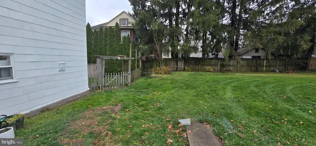 a view of a backyard with a garden
