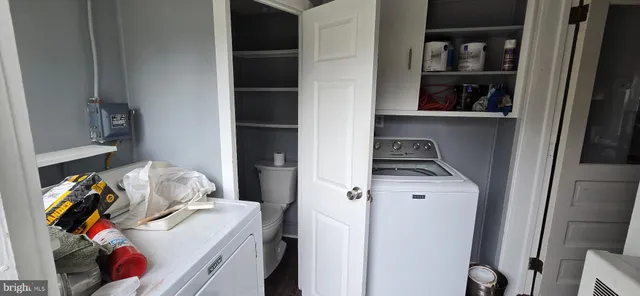 a bedroom with a bed and closet