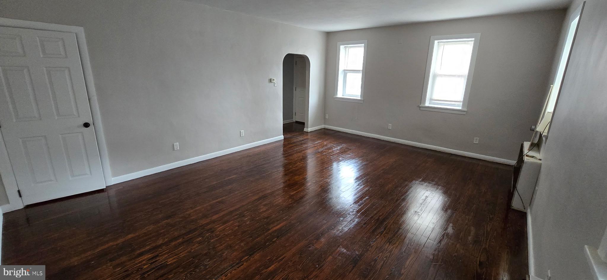 2194 Spinnerstown Road Spinnerstown, PA 18951 - Photo 7 of 27 an empty room with wooden floor and windows