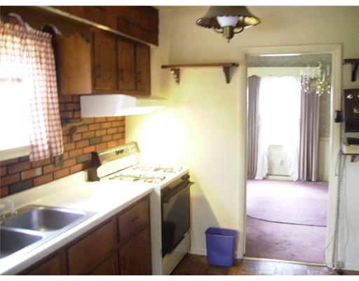 598 Mercer Road Beaver Falls, PA 15010 - Photo 5 of 15 Kitchen. Another view of the country kitchen with easy access into formal dining area.