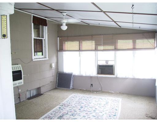 598 Mercer Road Beaver Falls, PA 15010 - Photo 9 of 15 Sunroom. This sunporch can be used for year round comfort because of a heater and window A/C - views of property can be seen from this porch