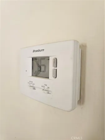 a view of wooden floor and windows in a room