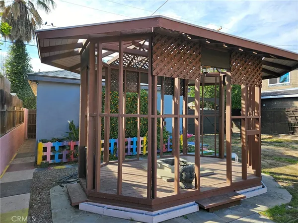 a view of outdoor space with deck having patio