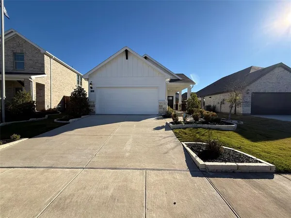 a view of a patio with couches chairs and a fire pit