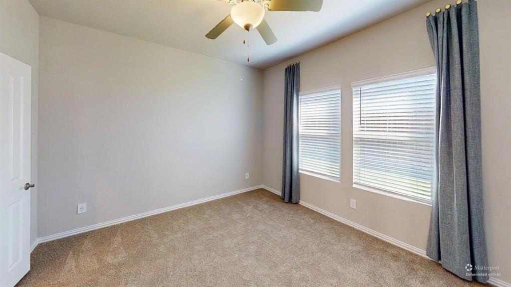1168 Yucca Avenue Lavon, TX 75166 - Photo 13 of 27 an empty room with a window