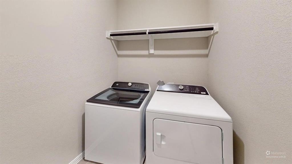 1168 Yucca Avenue Lavon, TX 75166 - Photo 22 of 27 a utility room with dryer and washer