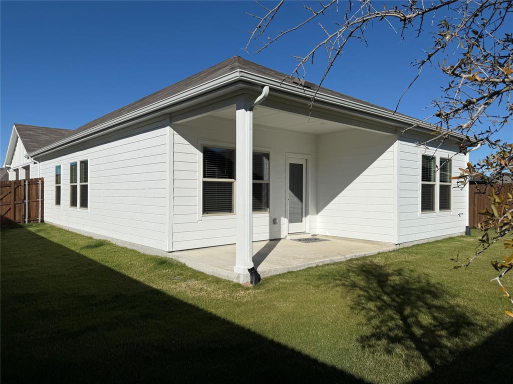 1168 Yucca Avenue Lavon, TX 75166 - Photo 23 of 27 a front view of a house with garden