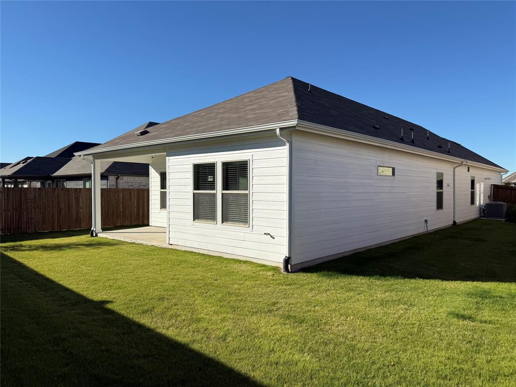 1168 Yucca Avenue Lavon, TX 75166 - Photo 27 of 27 a view of a backyard with a garden