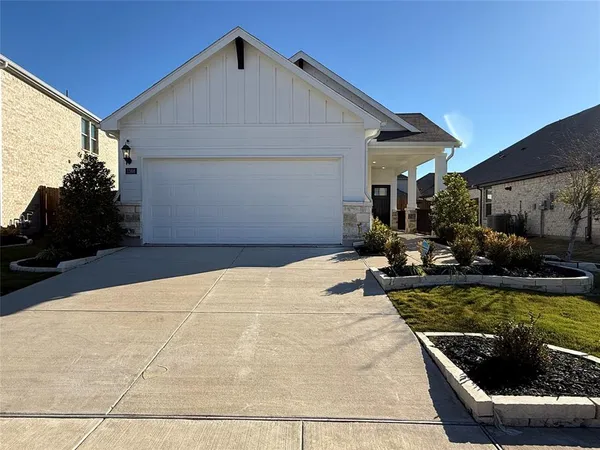 a view of a patio with swimming pool table and chairs