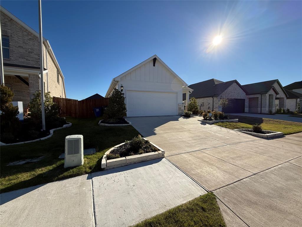 1168 Yucca Avenue Lavon, TX 75166 - Photo 4 of 27 a view of multiple houses with yard