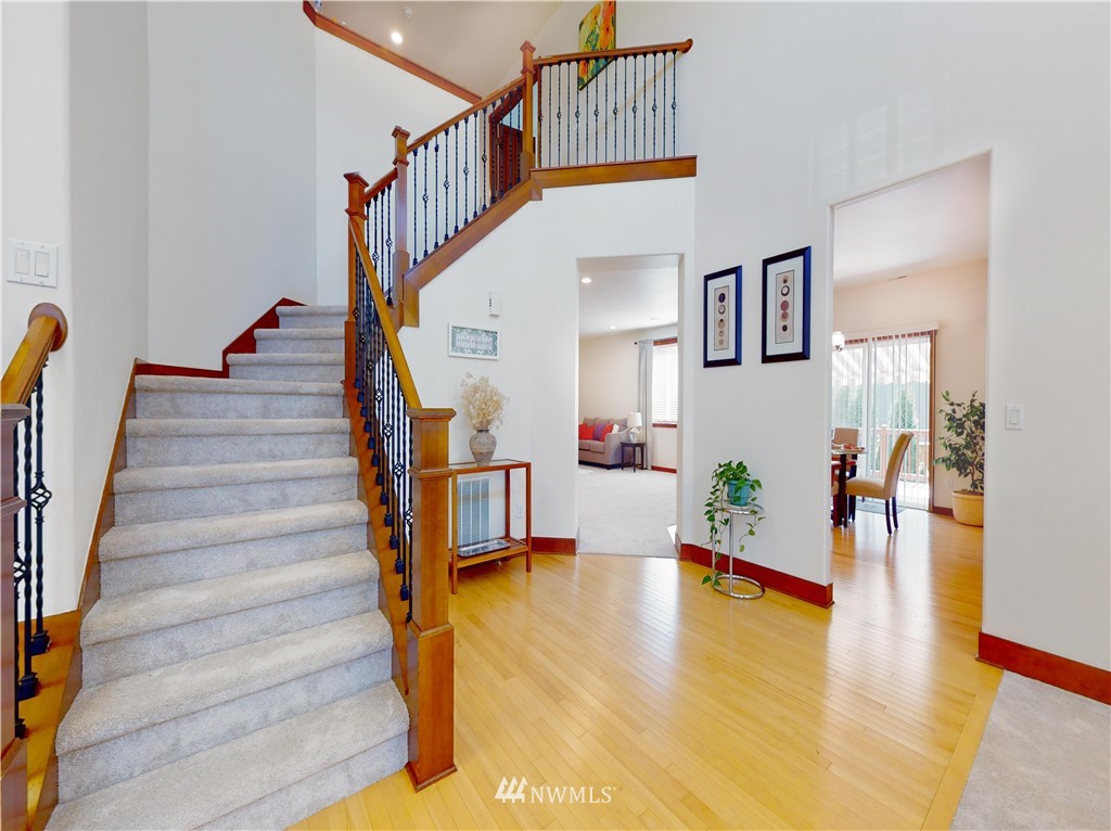 4002 216th Place Southeast Bothell, WA 98021 - Photo 13 of 28 a view of entryway and hall with wooden floor