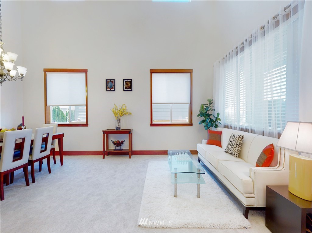 4002 216th Place Southeast Bothell, WA 98021 - Photo 4 of 28 a living room with furniture and a window