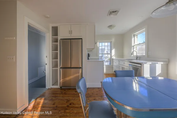a view of a dining room with furniture