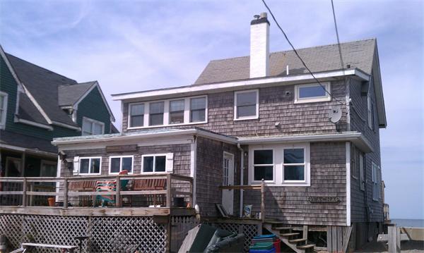 129 Turner Road Scituate, MA 02066 - Photo 1 of 15 a front view of a house with a yard