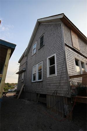 129 Turner Road Scituate, MA 02066 - Photo 2 of 15 a front view of a house with a yard
