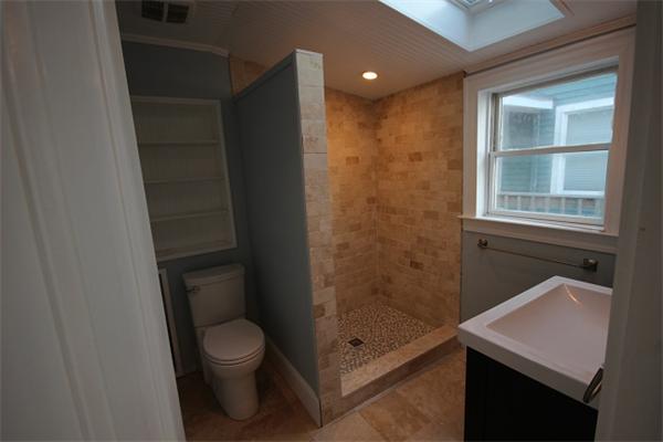 129 Turner Road Scituate, MA 02066 - Photo 5 of 15 a bathroom with a granite countertop sink a toilet and shower